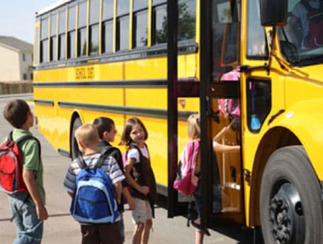 NHTSA recommends belts be installed on all large School Buses